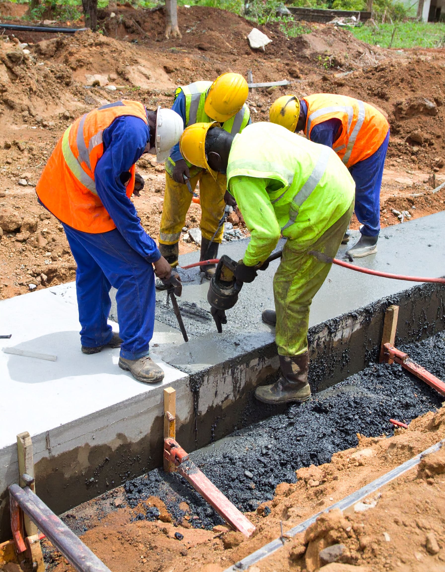 Firefly_A realistic image of African construction workers applying waterproofing to a buildin 442633
