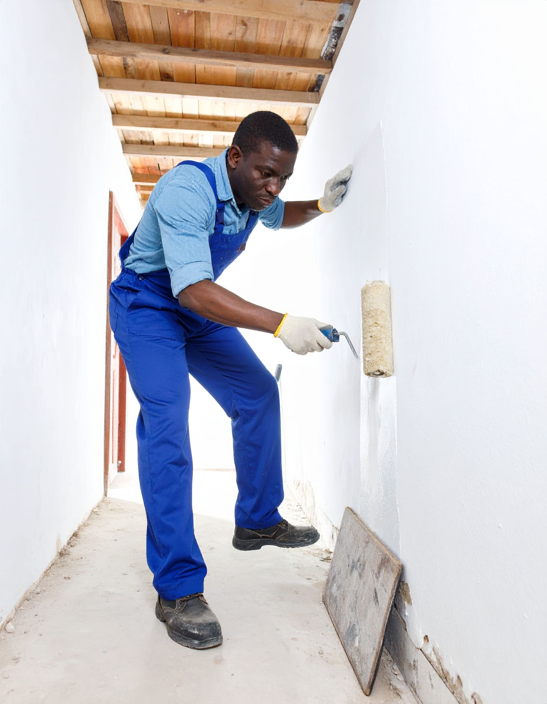 Firefly_A realistic image of an African technician treating a rising damp problem on the lowe 442633
